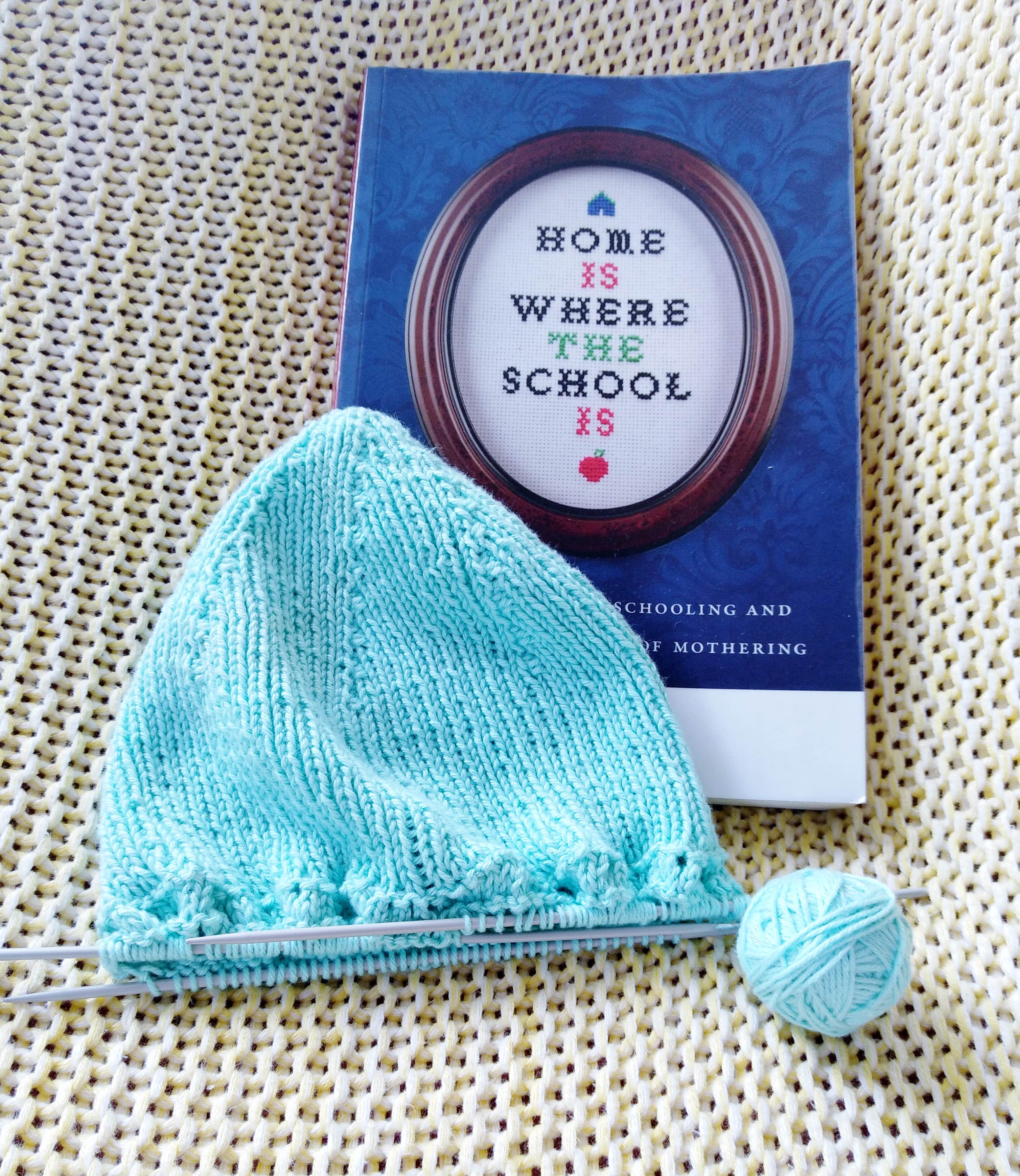 Copy of Home is Where the School Is and unfinished knitted hat